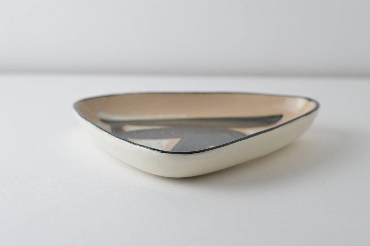 1970 – Triangular ceramic dish by Philippe Lambercy