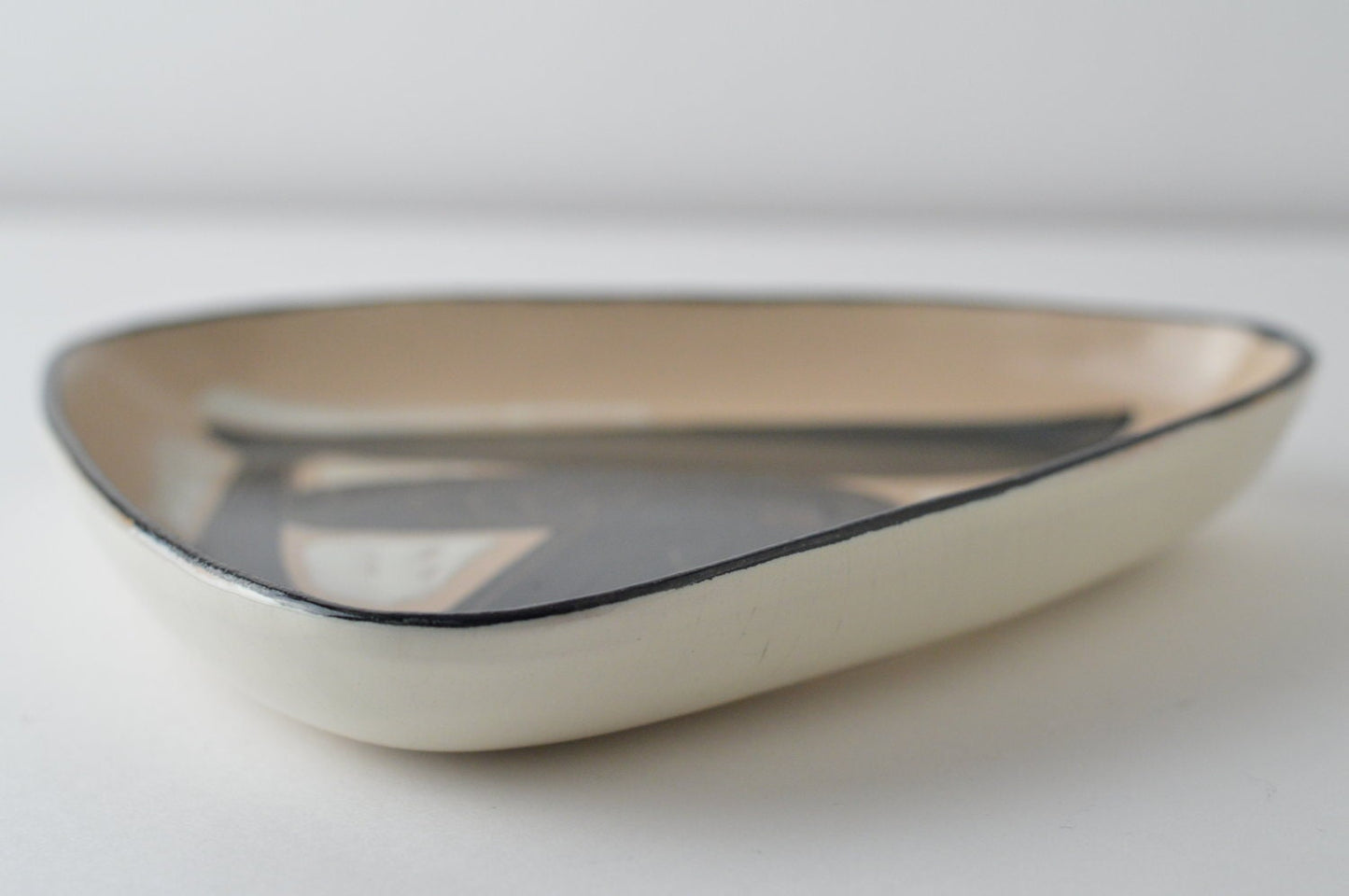 1970 – Triangular ceramic dish by Philippe Lambercy