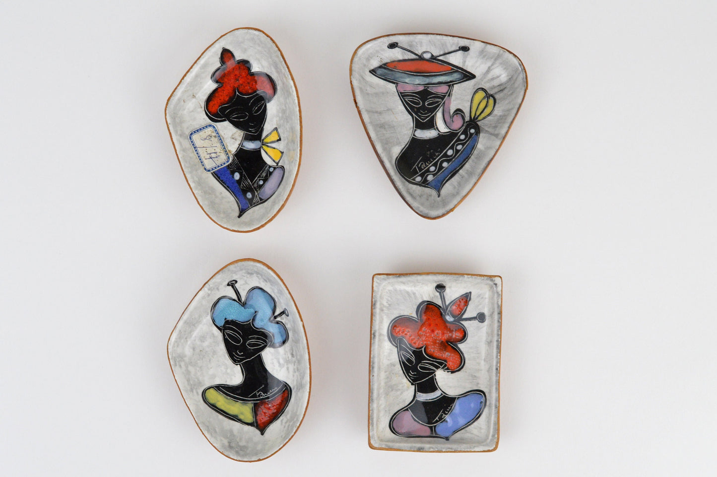 1950s– Set of 4 Signed Italian Leather Clad Ceramic Dishes