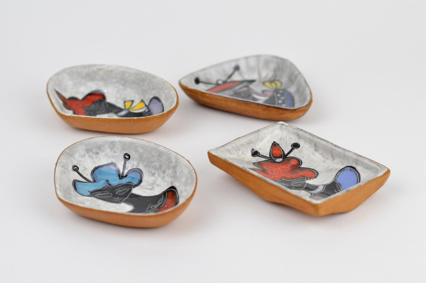 1950s– Set of 4 Signed Italian Leather Clad Ceramic Dishes
