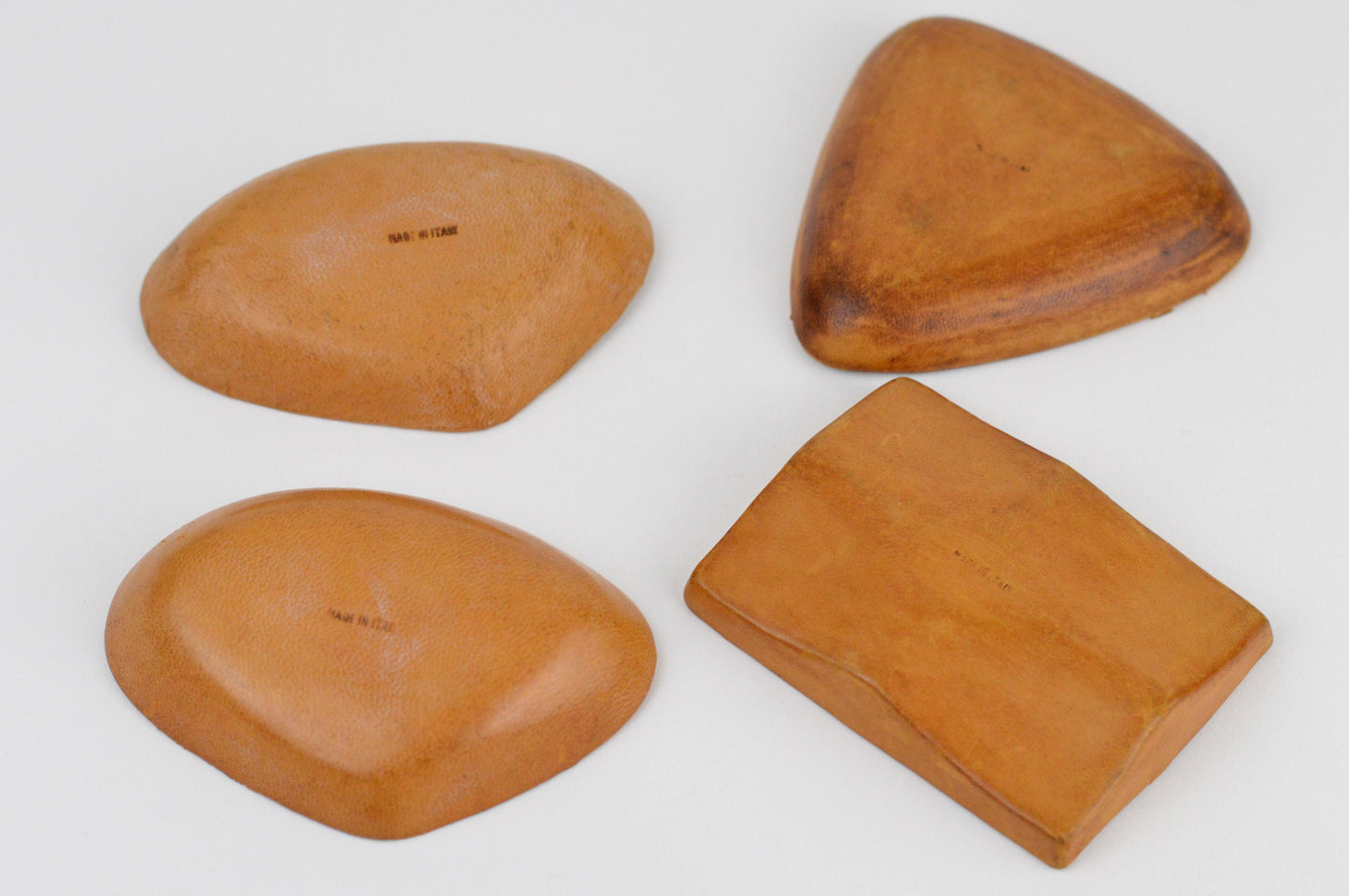 1950s– Set of 4 Signed Italian Leather Clad Ceramic Dishes