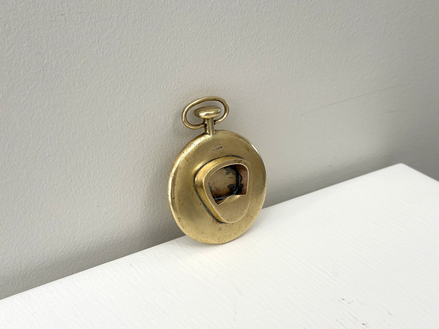 1950s – Carl Auböck bottle opener in the style of a pocket watch