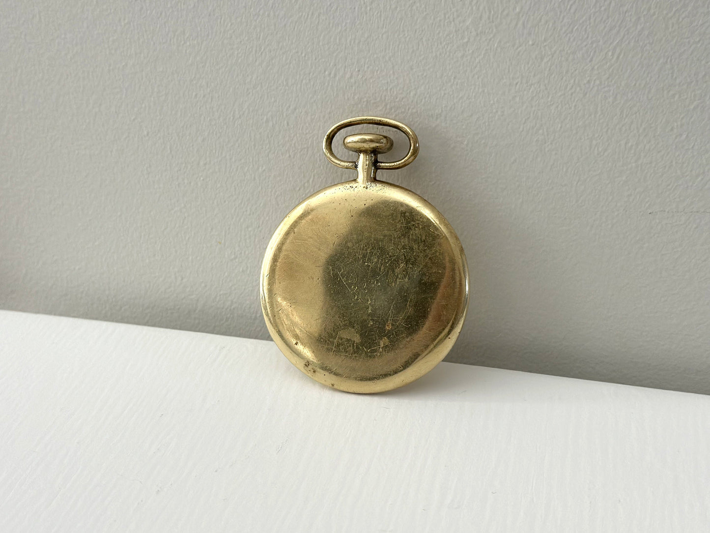 1950s – Carl Auböck bottle opener in the style of a pocket watch