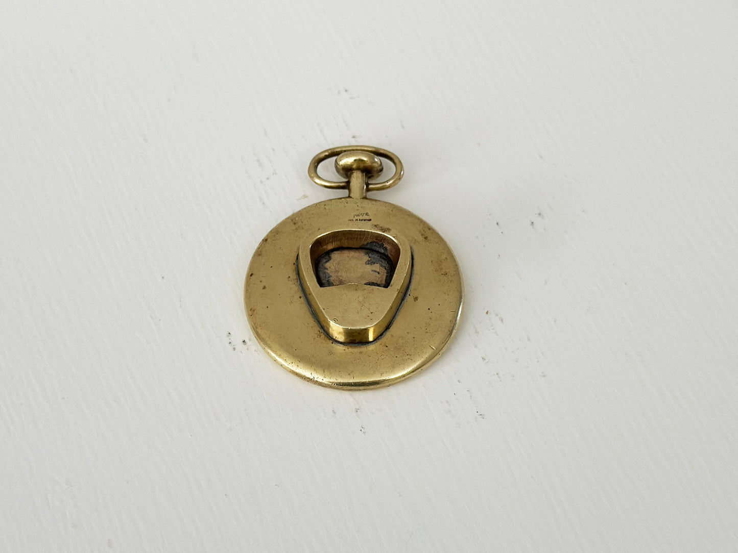 1950s – Carl Auböck bottle opener in the style of a pocket watch