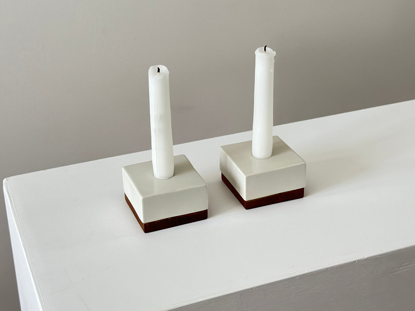 1950s – Michael Lax for Raymor pair of porcelain and walnut candle holders