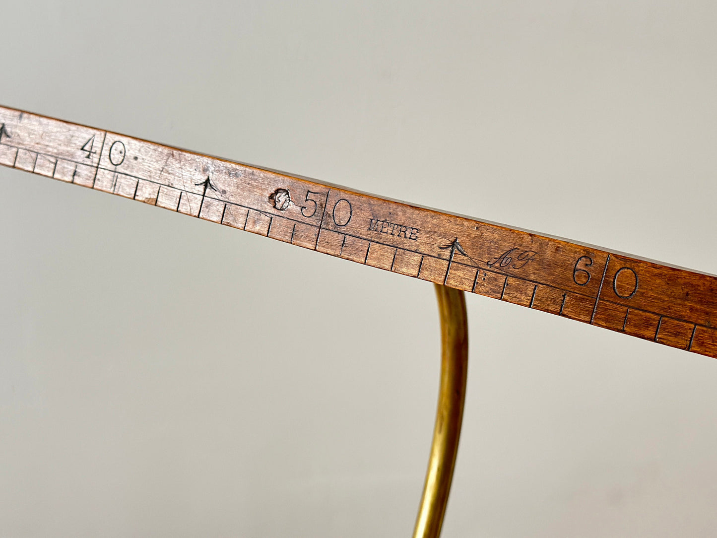 19th Century – French tailors measuring stick on brass arm wall mount
