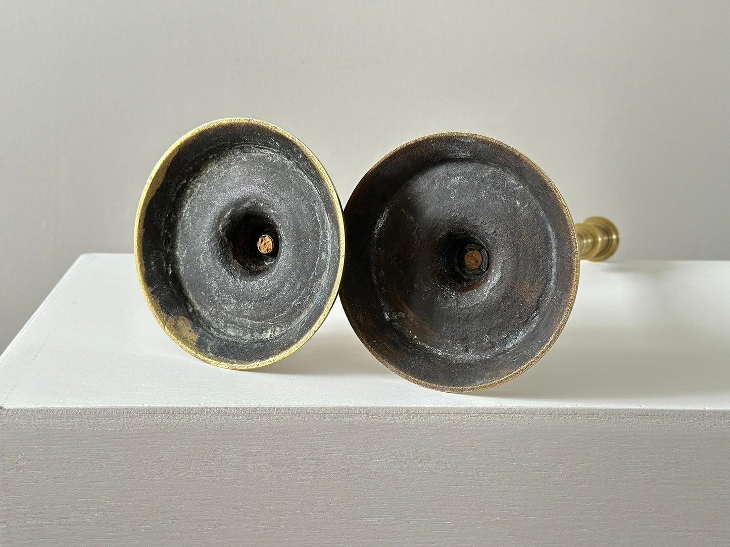 19th Century – Pair of tall solid brass candlesticks, made in England