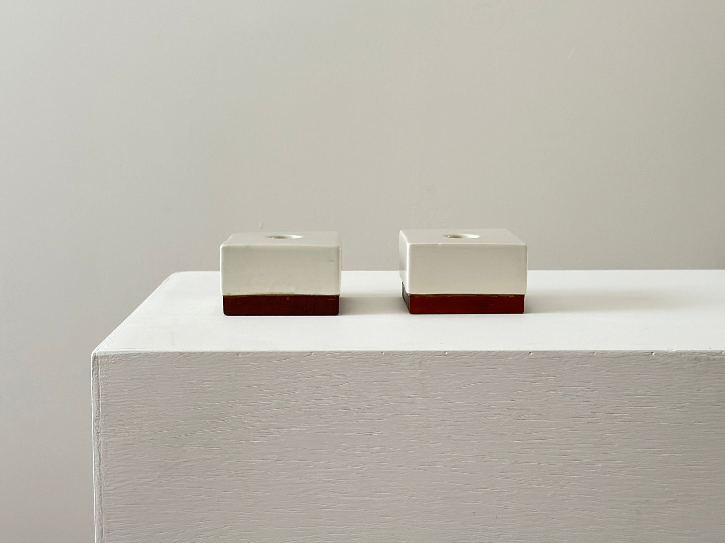 1950s – Michael Lax for Raymor pair of porcelain and walnut candle holders