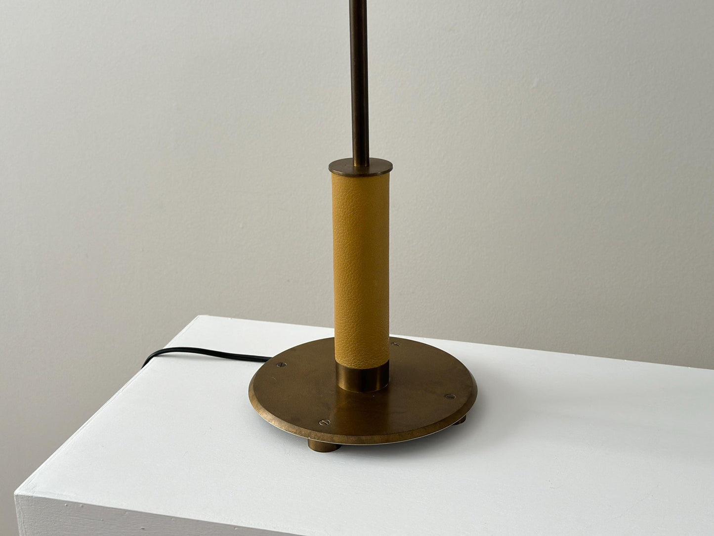 Vintage French patinated and leather wrapped tall table buffet lamp attributed to Christian Liaigre