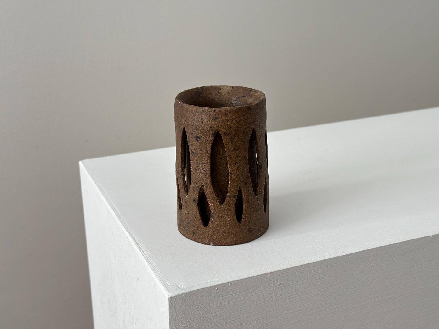 Vintage one-of-a-kind brutalist stoneware vase with double wall cutout design