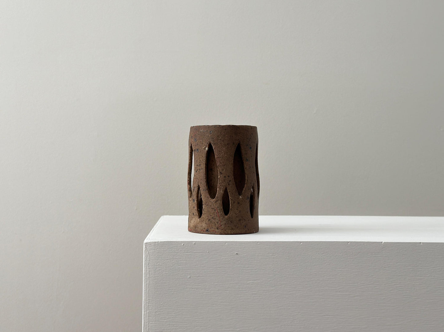 Vintage one-of-a-kind brutalist stoneware vase with double wall cutout design
