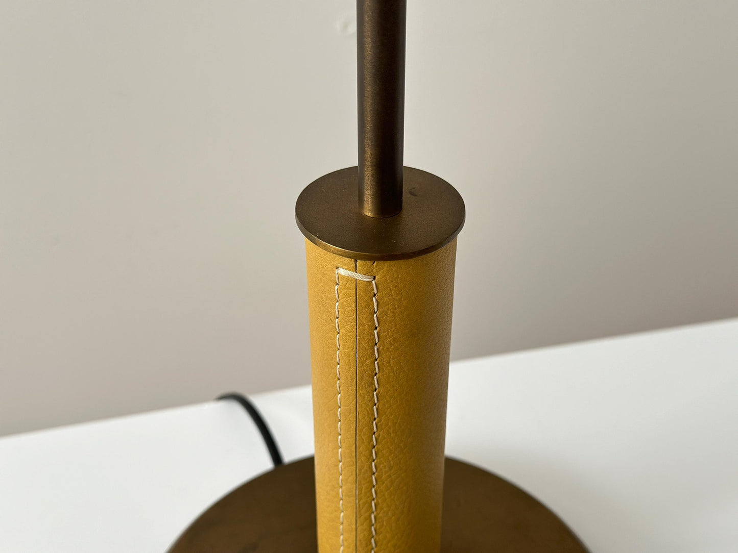 Vintage French patinated and leather wrapped tall table buffet lamp attributed to Christian Liaigre
