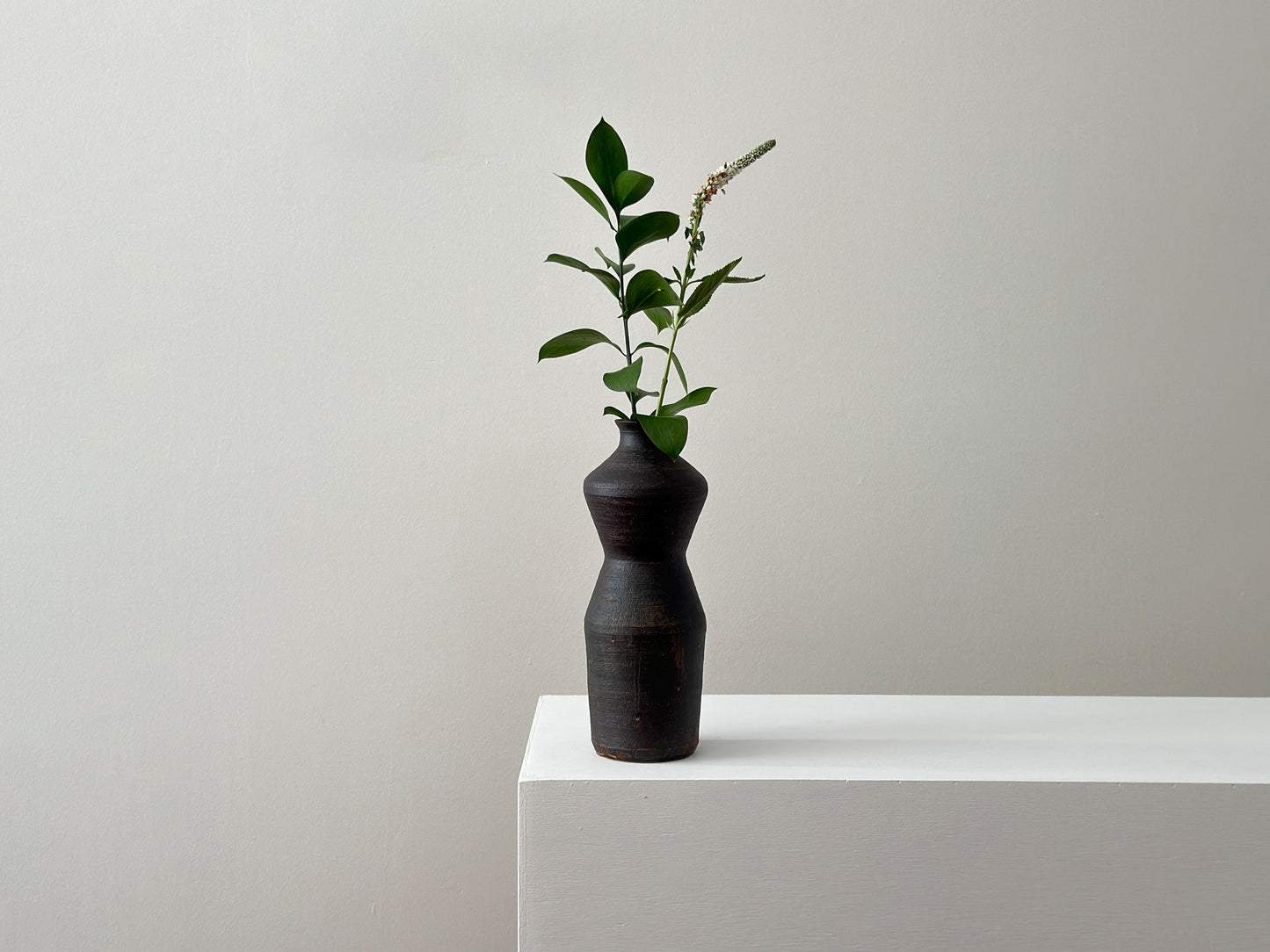 Vintage 10" studio stoneware hourglass vase with rustic charcoal texture
