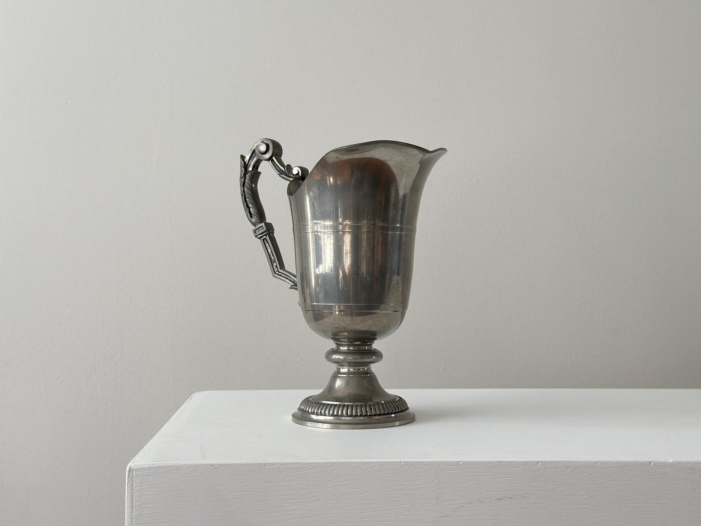 Vintage handcrafted French pewter pitcher with gothic handle and victorian styling