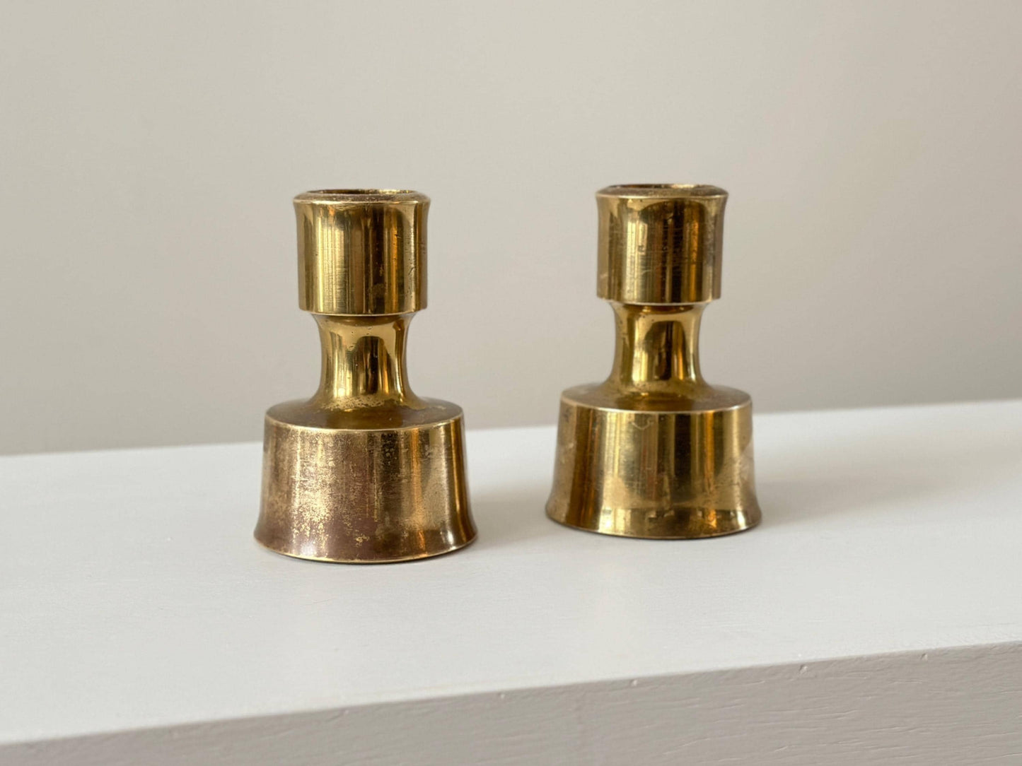 1950s – Solid brass candle holders by Jens Harald Quistgaard for Dansk. Produced in Finland.