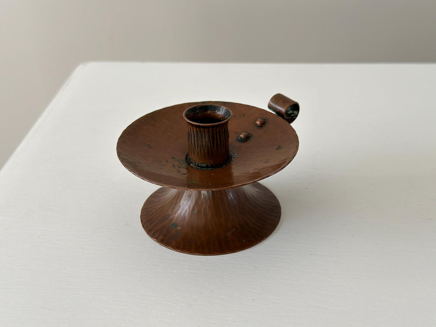 1920s – Roycroft Hammered Copper Small Loop Handle Candlestick