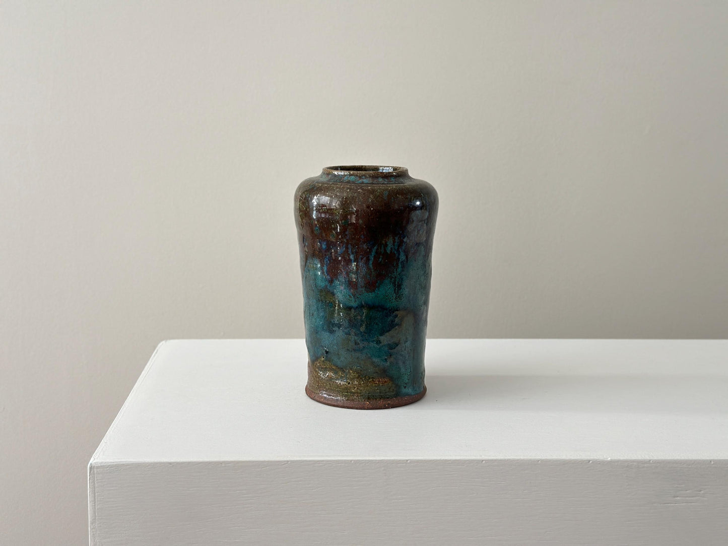 1980 – Signed studio stoneware vase with rich tones and verdigris glaze