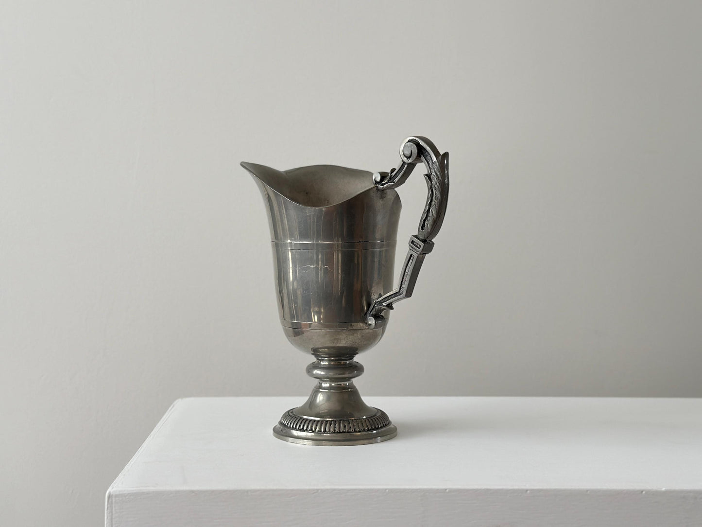 Vintage handcrafted French pewter pitcher with gothic handle and victorian styling