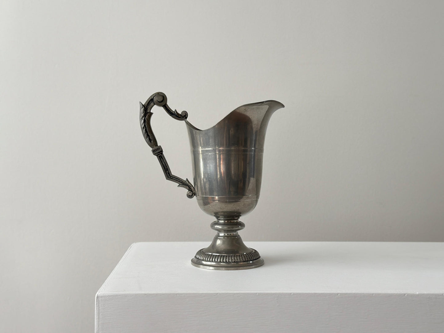 Vintage handcrafted French pewter pitcher with gothic handle and victorian styling