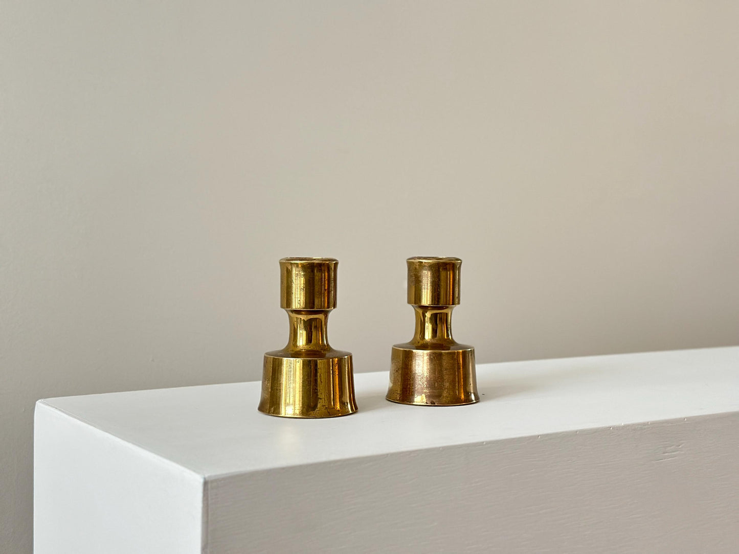 1950s – Solid brass candle holders by Jens Harald Quistgaard for Dansk. Produced in Finland.