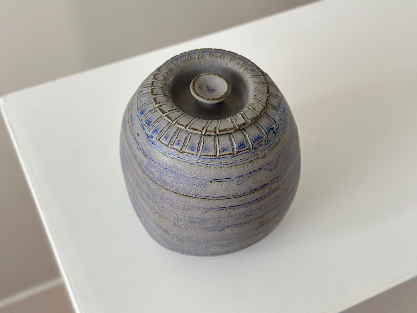 Vintage blue grey studio pottery jar with top, signed.