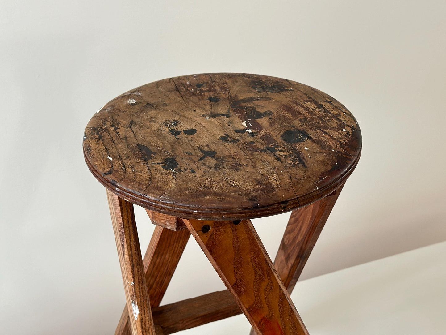 1934 – Modernist craftsman stool with angular legs and patina