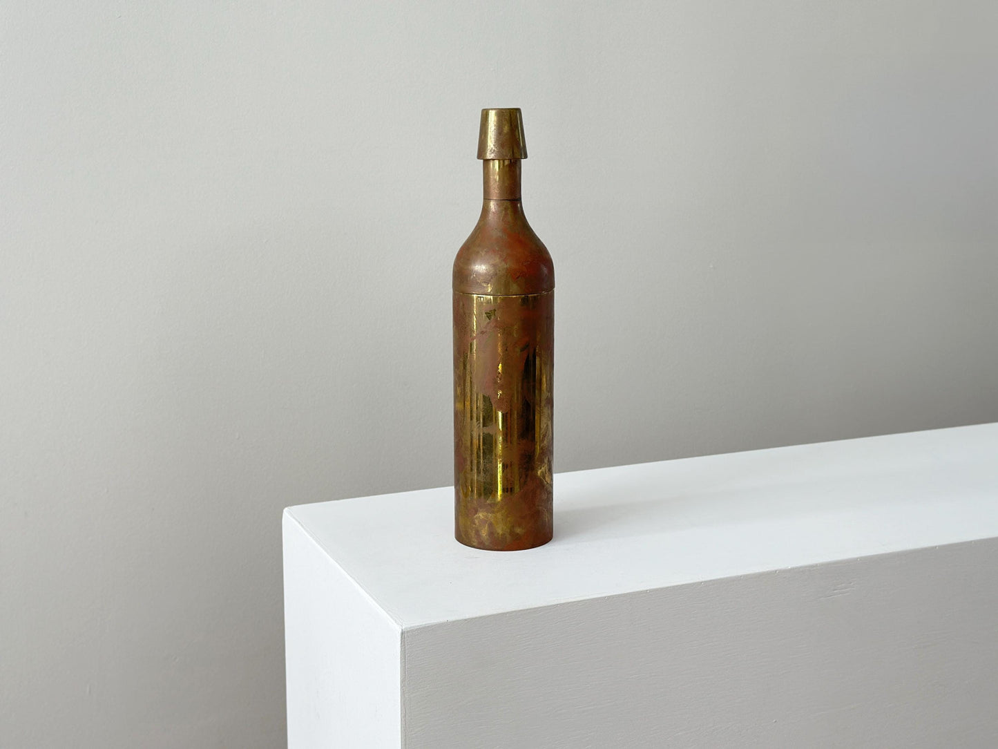 Vintage cocktail shaker with modernist brass bottle form