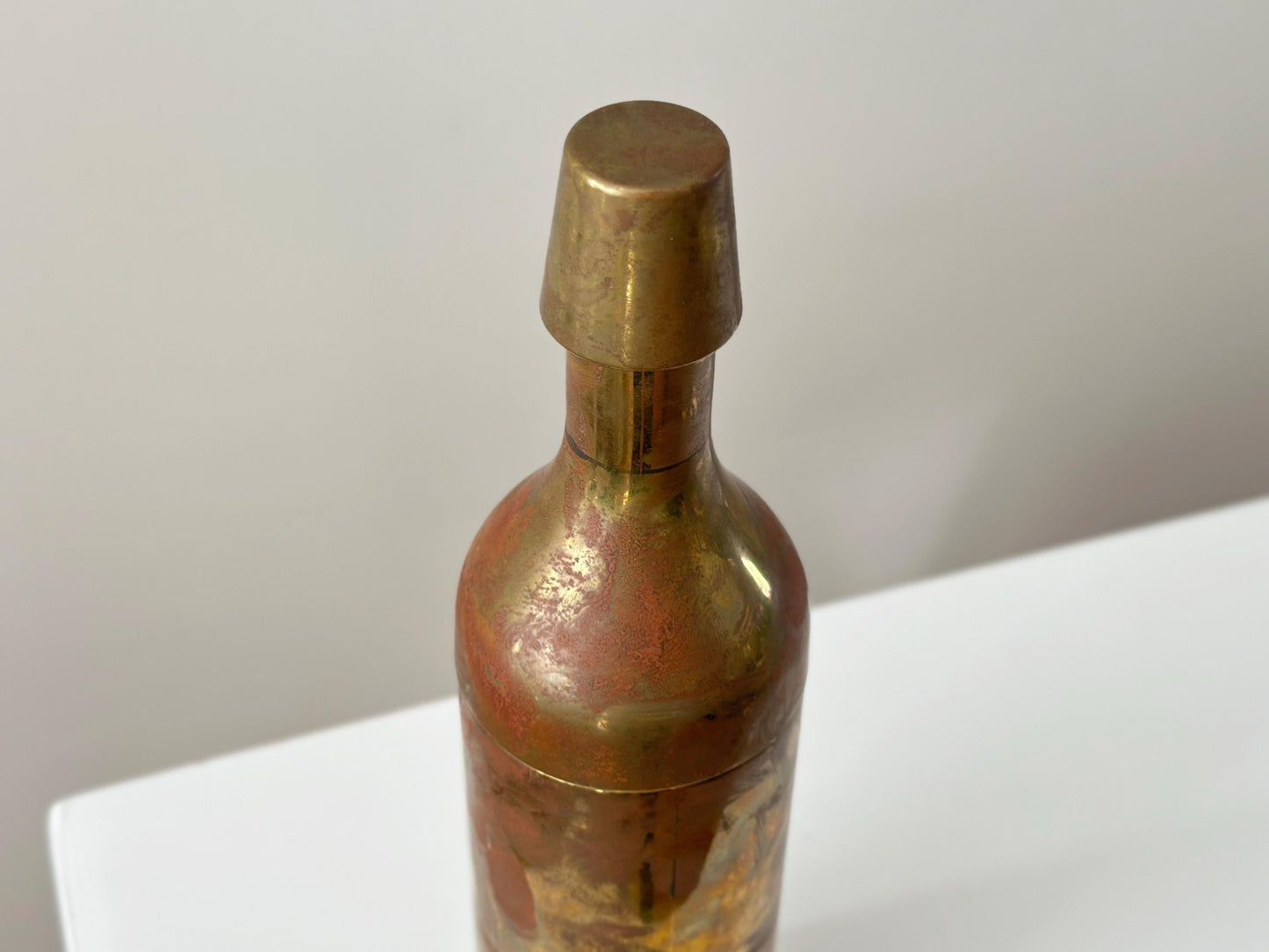 Vintage cocktail shaker with modernist brass bottle form