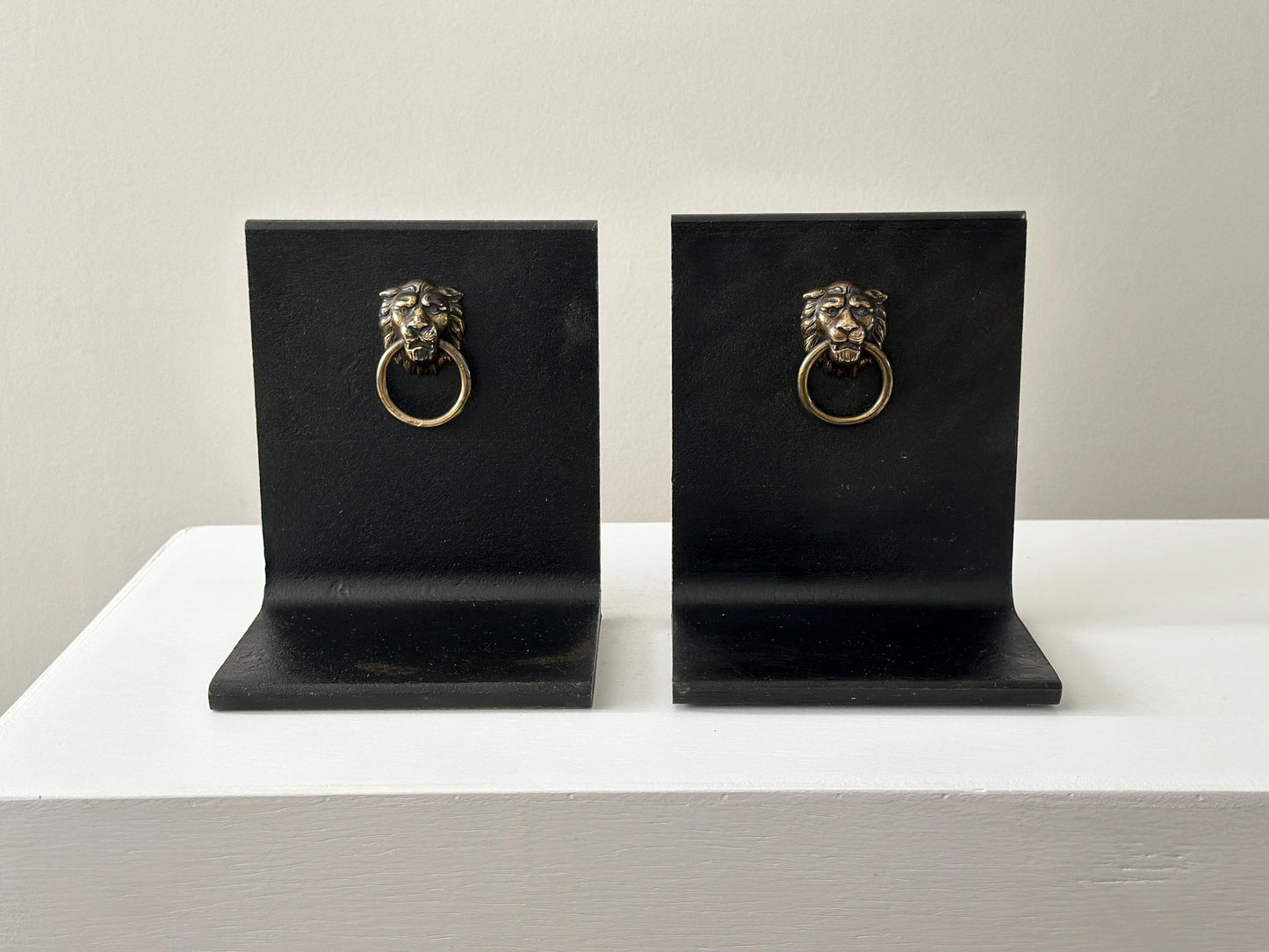 Vintage steel and brass lion head knocker bookends