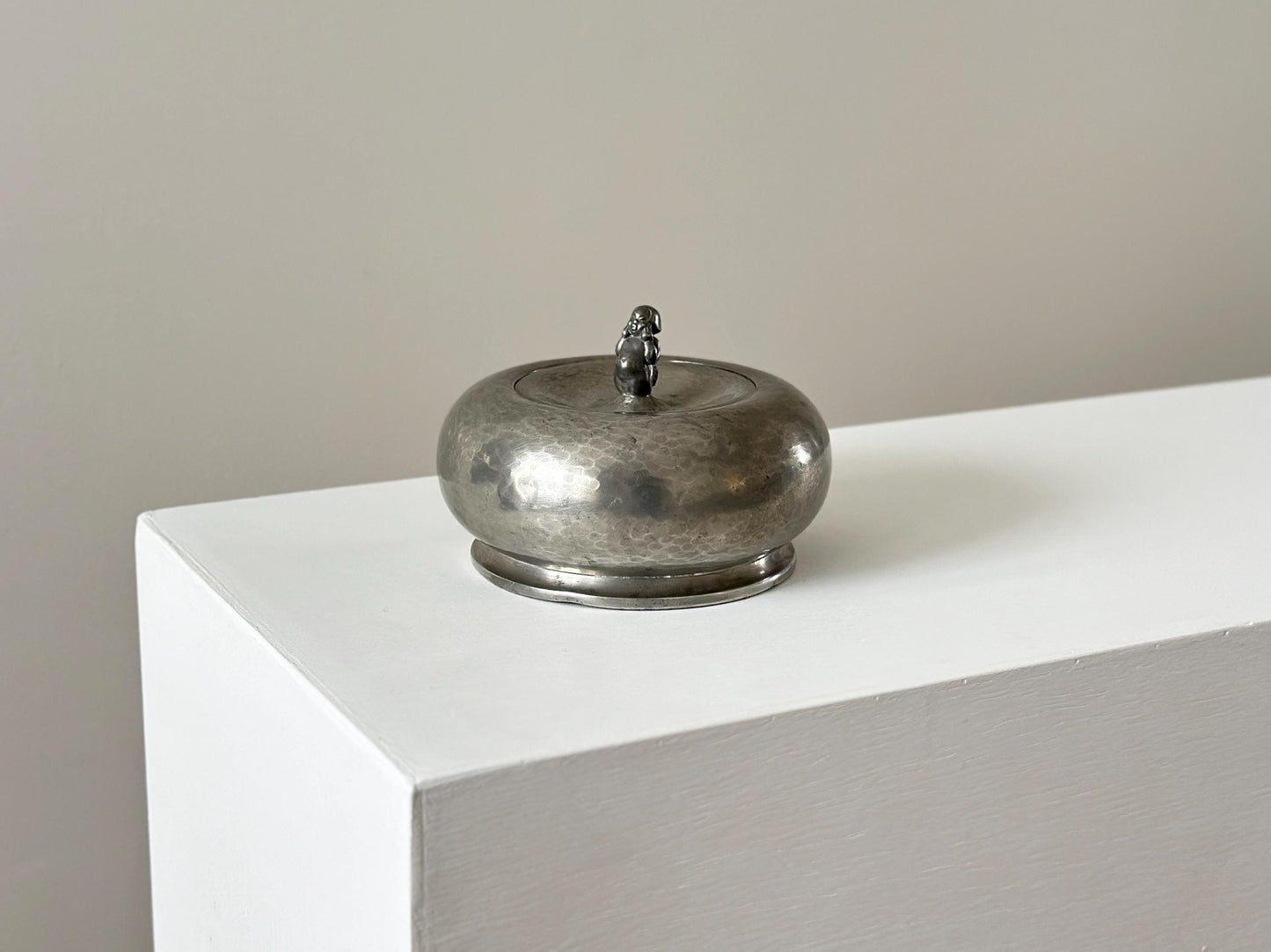 1920s – Danish rounded form hammered pewter box with merman lid
