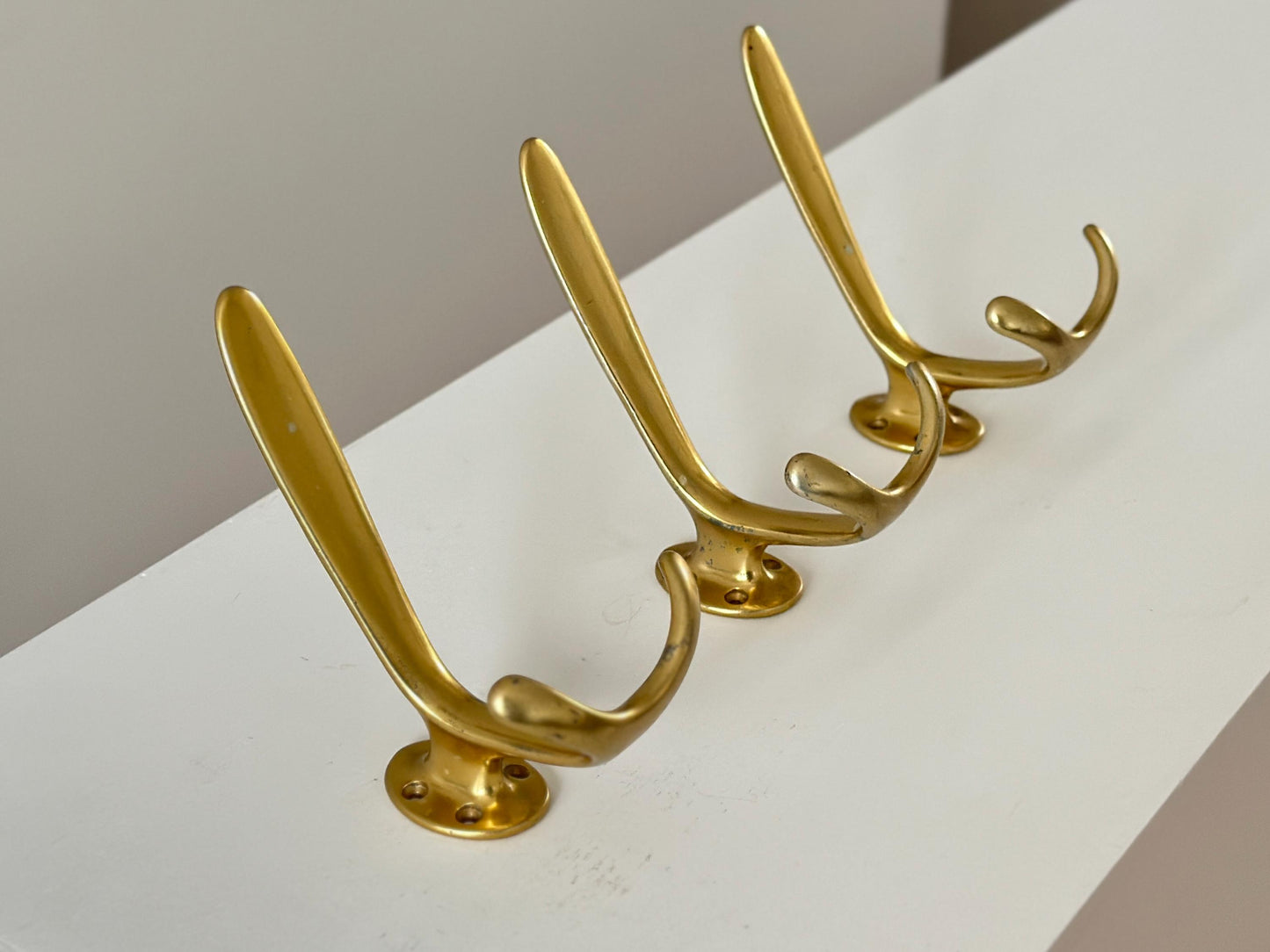 1960s – Set of 3 mid-century aluminum wall hooks