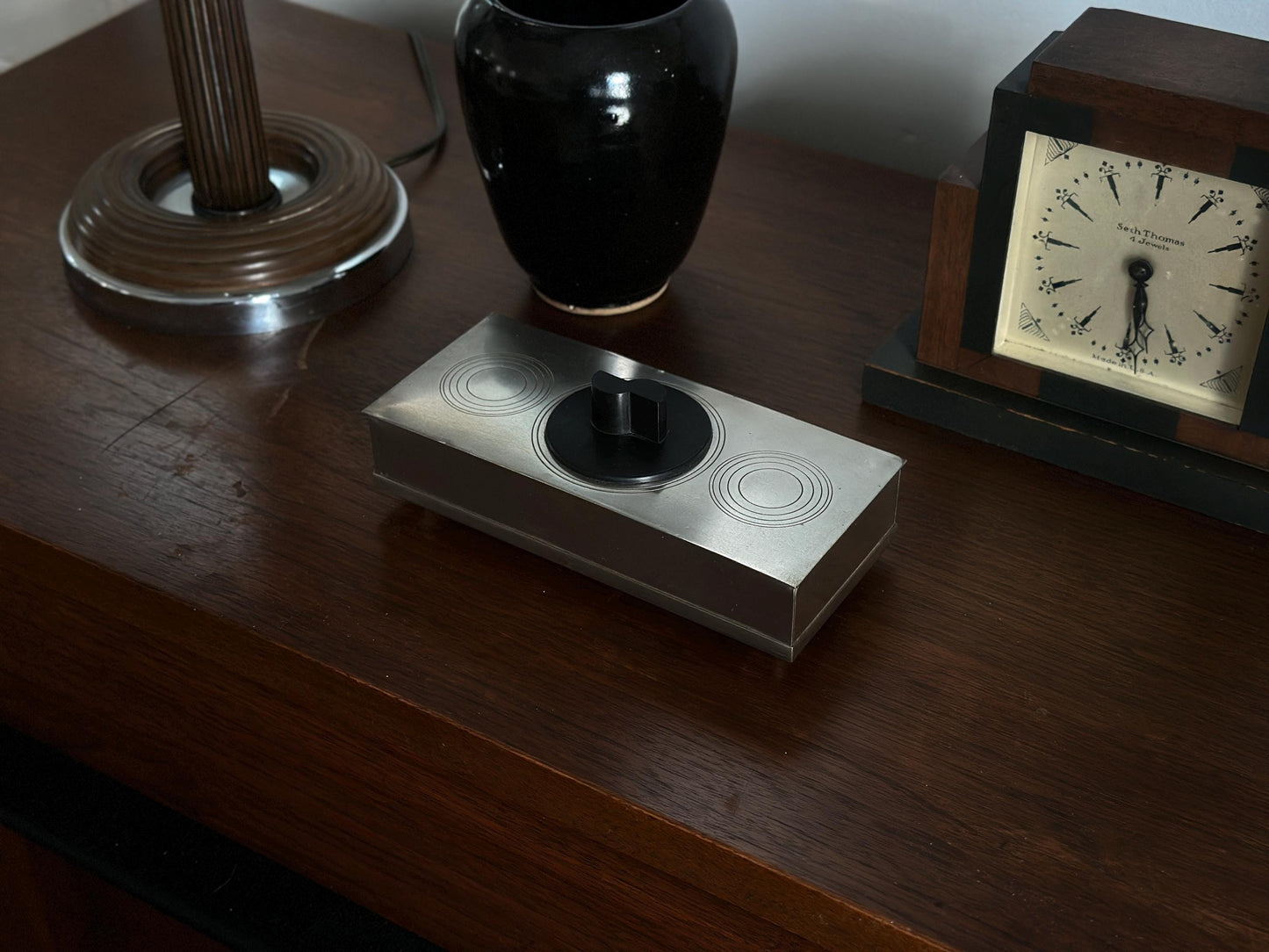 1934 – Art Deco nickel and bakelite cigarette box