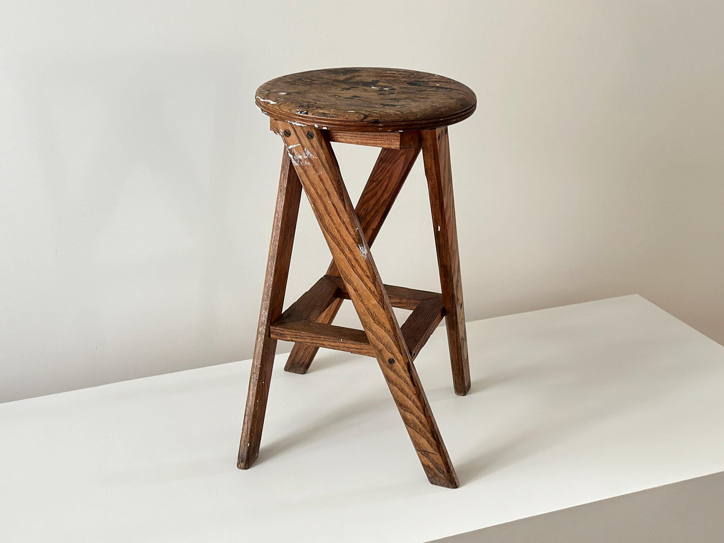 1934 – Modernist craftsman stool with angular legs and patina
