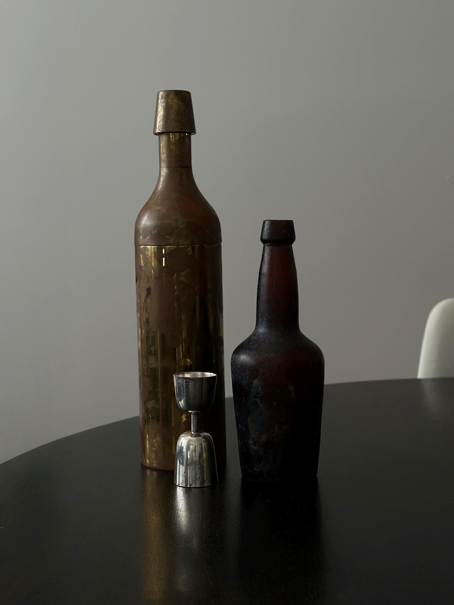 Vintage cocktail shaker with modernist brass bottle form