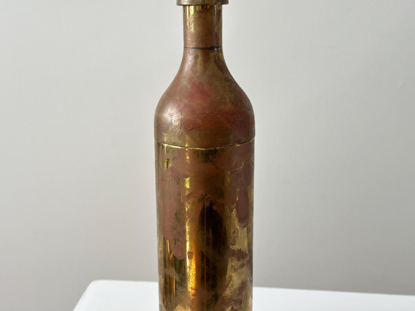 Vintage cocktail shaker with modernist brass bottle form