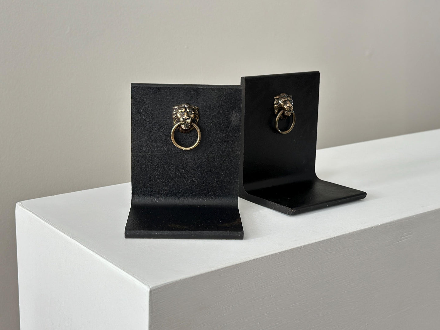 Vintage steel and brass lion head knocker bookends
