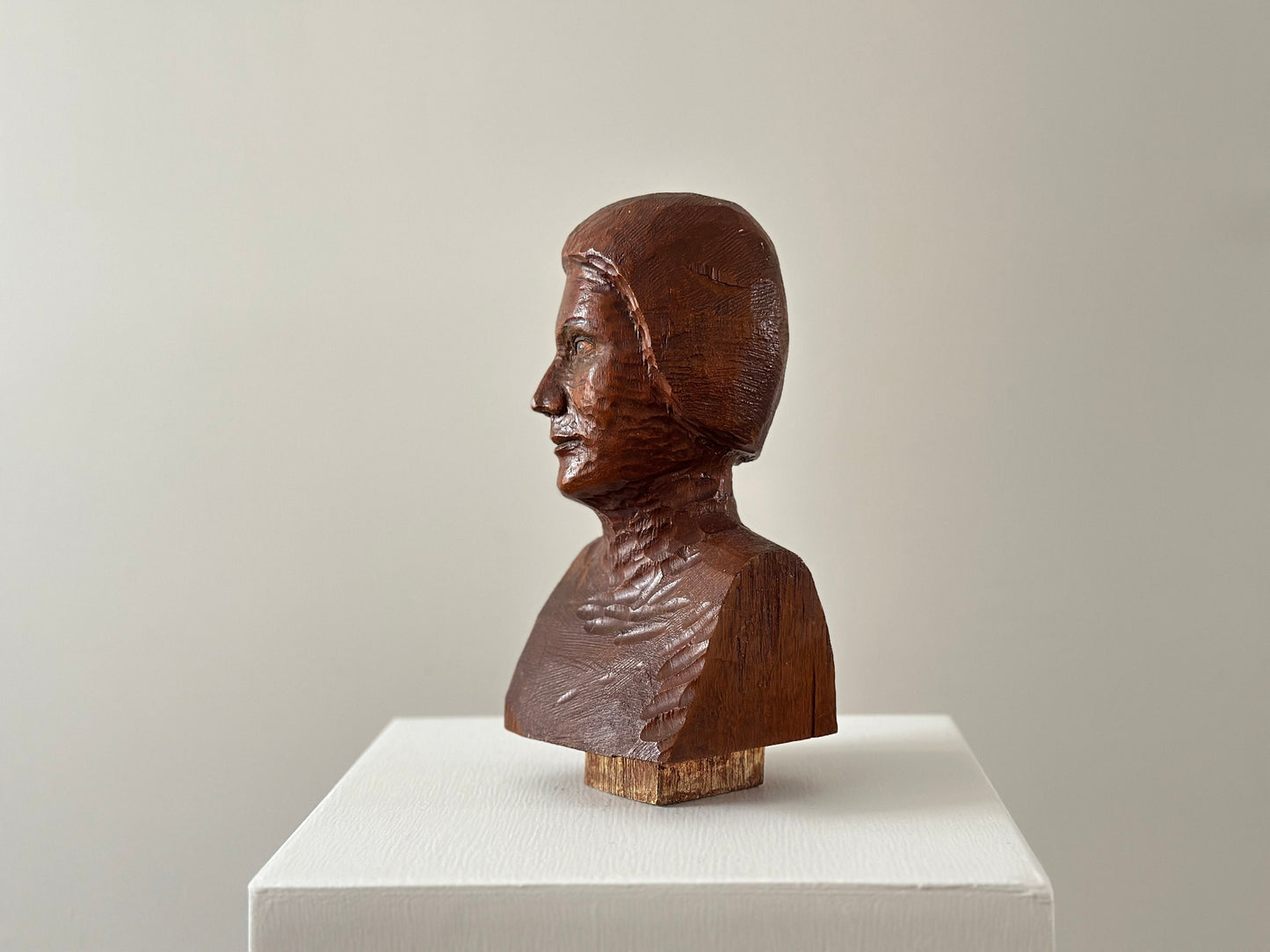 Early 20th Century – Bust of a woman with hand painted eyes, chiseled wood