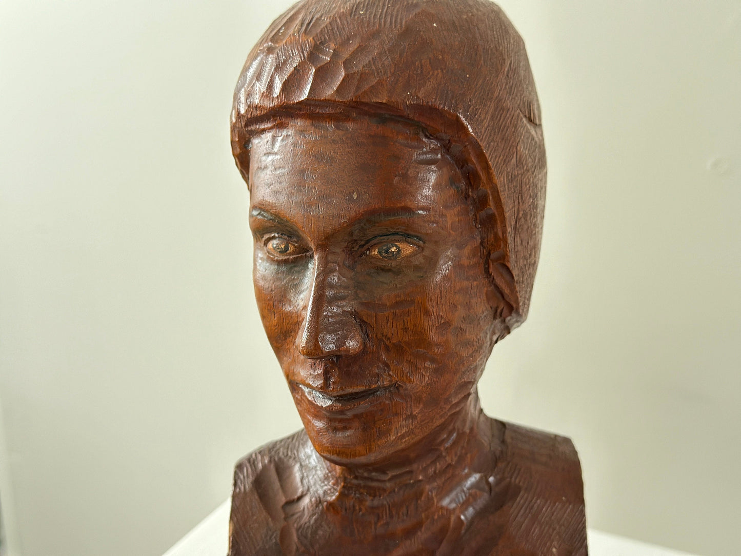 Early 20th Century – Bust of a woman with hand painted eyes, chiseled wood