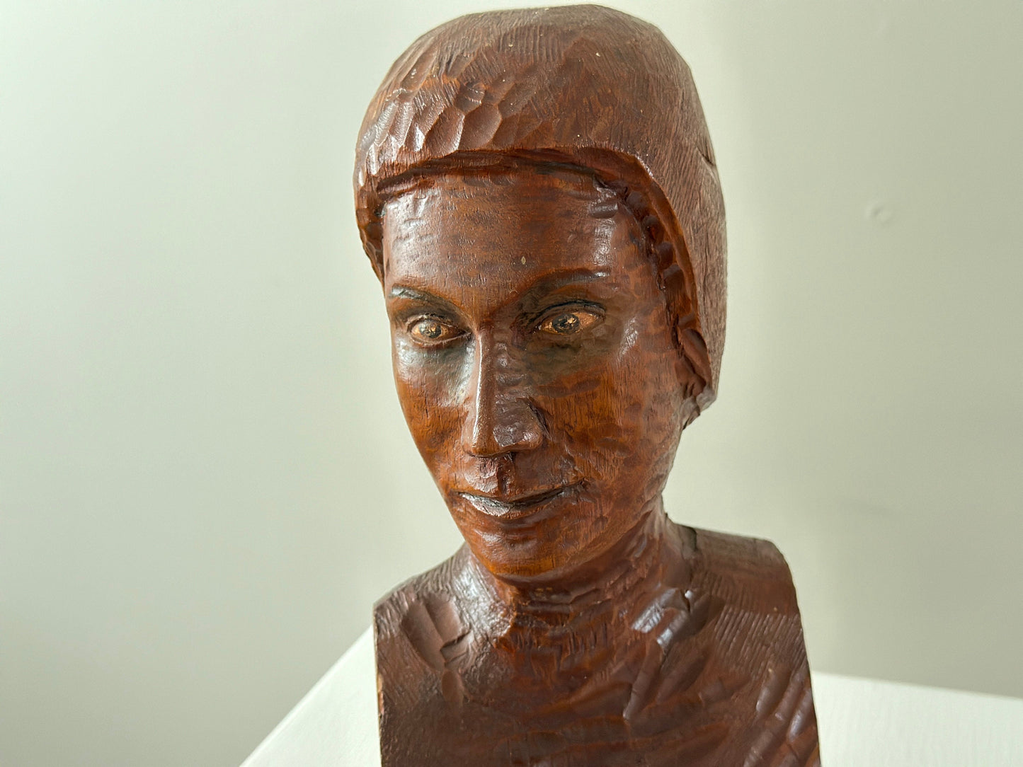 Early 20th Century – Bust of a woman with hand painted eyes, chiseled wood