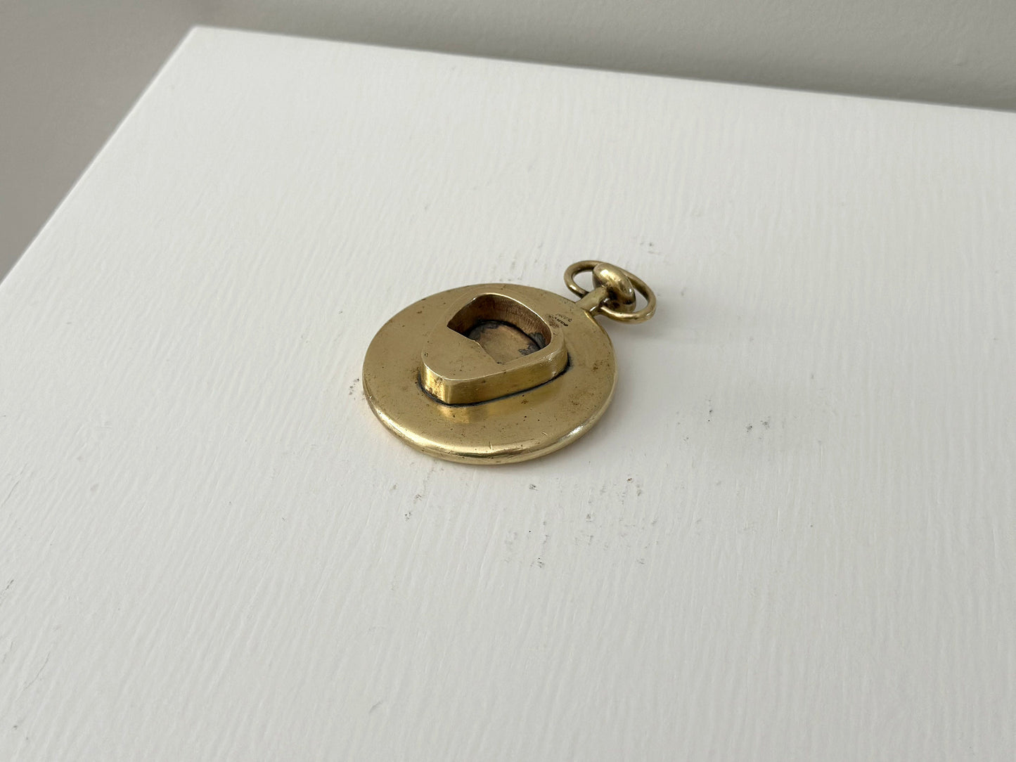 1950s – Carl Auböck bottle opener in the style of a pocket watch