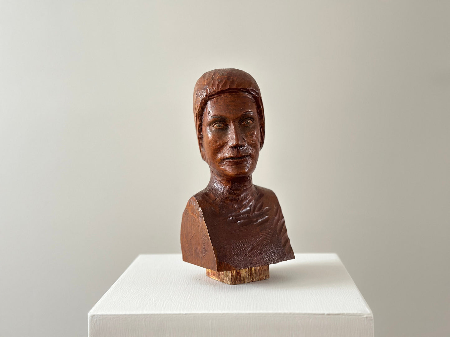 Early 20th Century – Bust of a woman with hand painted eyes, chiseled wood