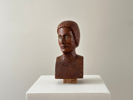 Early 20th Century – Bust of a woman with hand painted eyes, chiseled wood