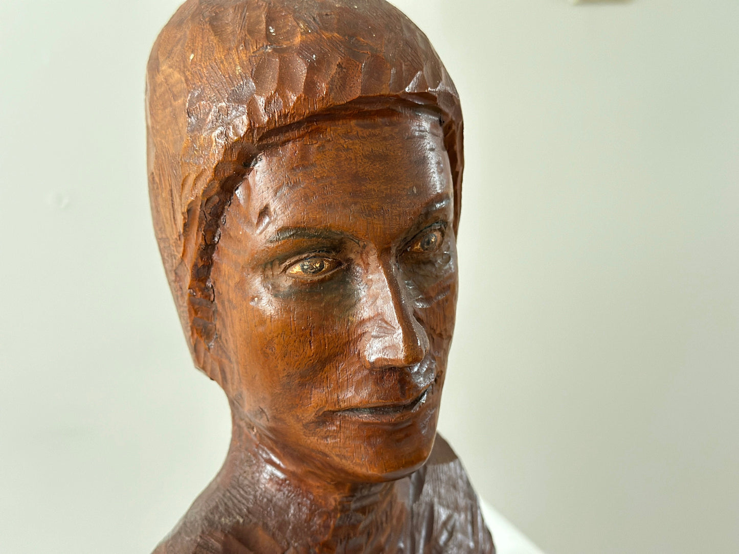 Early 20th Century – Bust of a woman with hand painted eyes, chiseled wood