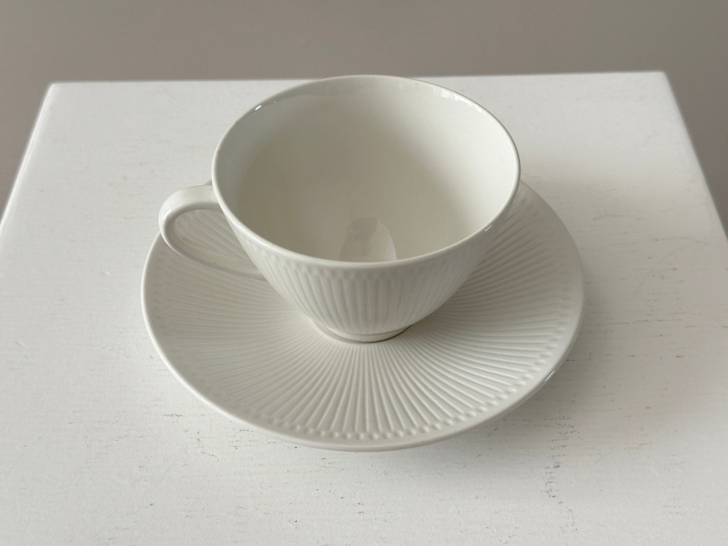 1957 – Set of 4 Rörstrand white teacups and saucers by Hertha Bengtson