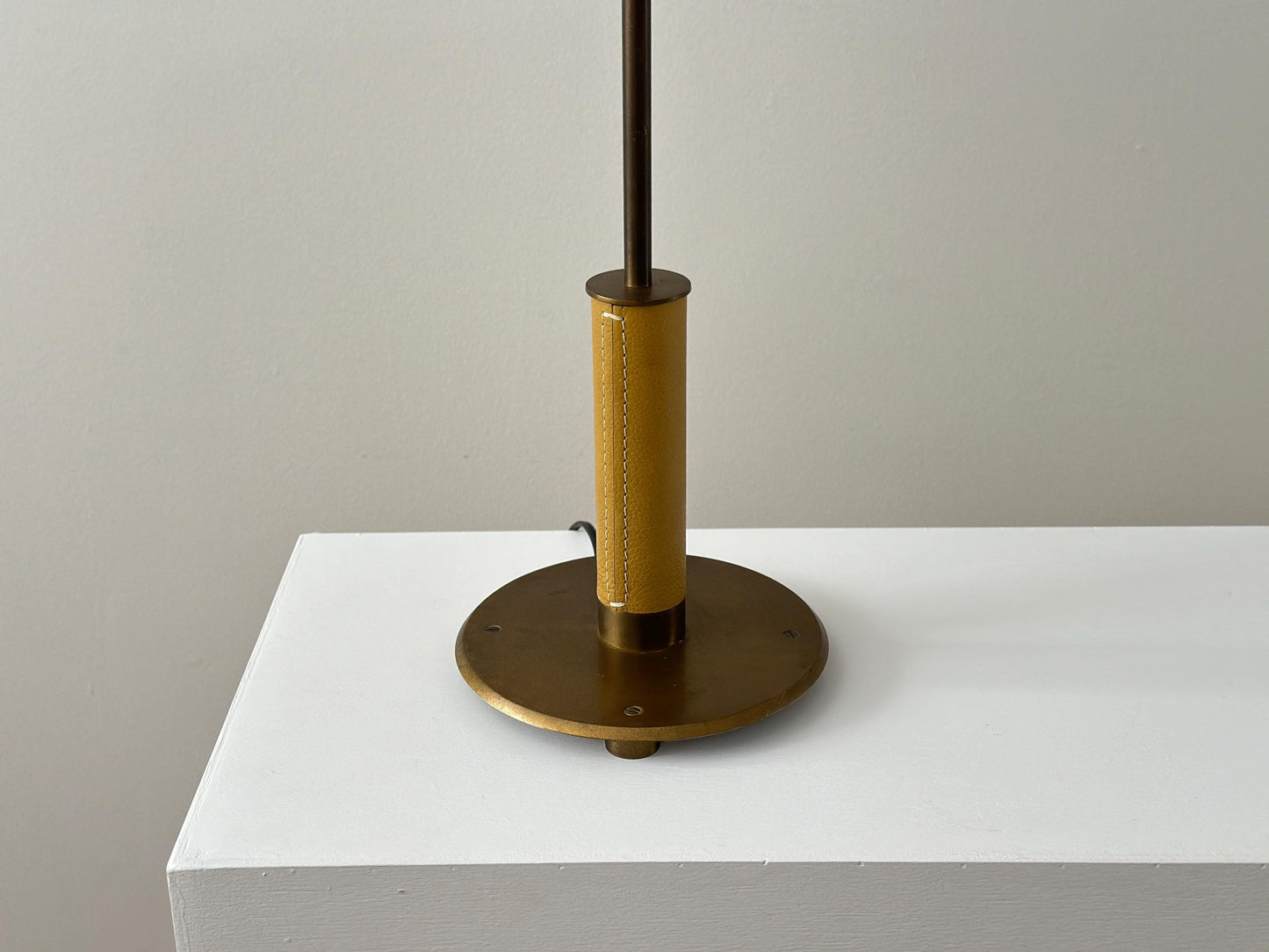 Vintage French patinated and leather wrapped tall table buffet lamp attributed to Christian Liaigre