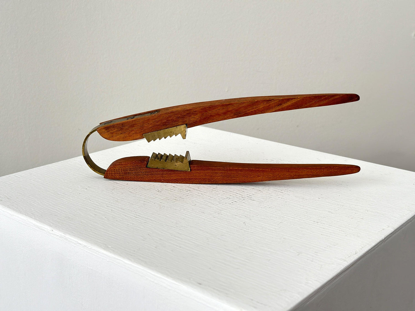 1950s – Danish teak and brass nutcracker by Poul Knudsen