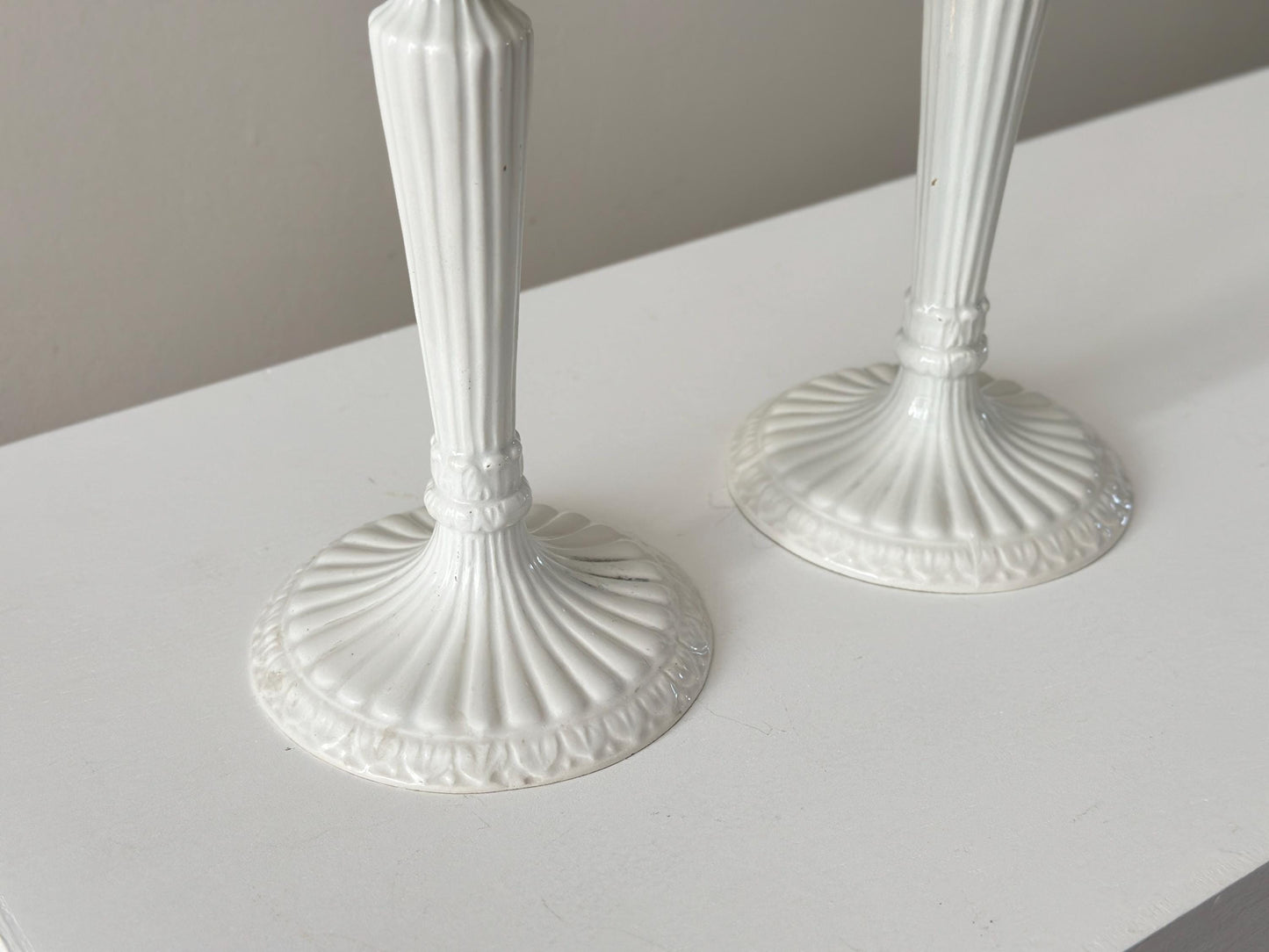 1959 – Pair of Mid Century Italian neoclassical Corinthian column white glazed ceramic candlesticks imported by Bonwit Teller