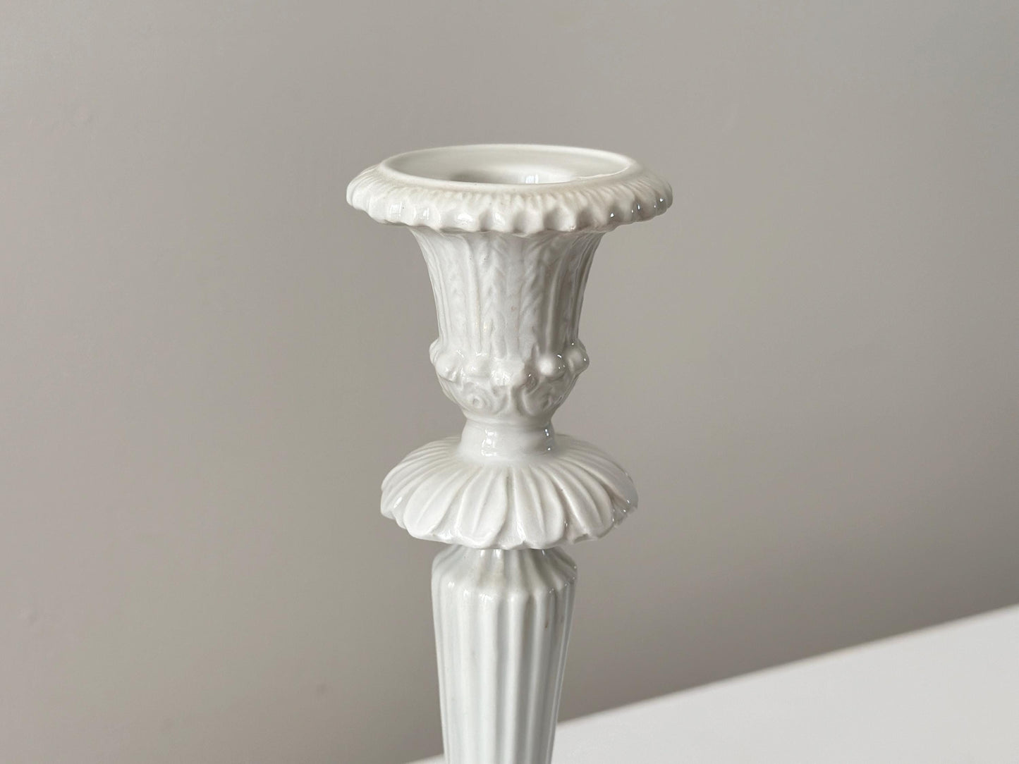 1959 – Pair of Mid Century Italian neoclassical Corinthian column white glazed ceramic candlesticks imported by Bonwit Teller