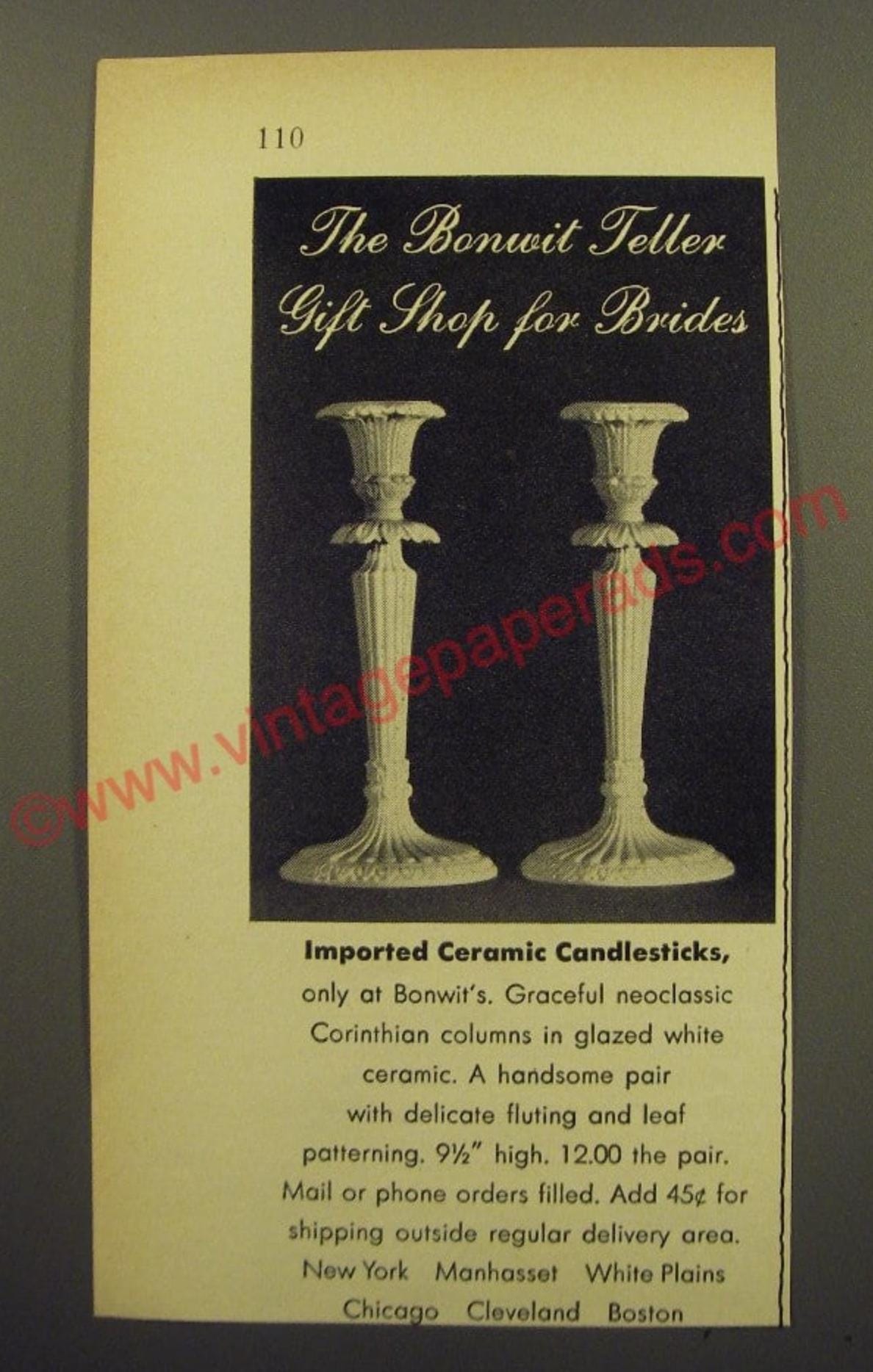 1959 – Pair of Mid Century Italian neoclassical Corinthian column white glazed ceramic candlesticks imported by Bonwit Teller