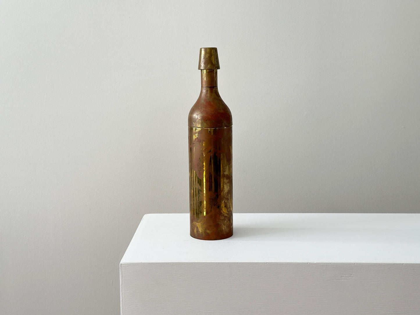 Vintage cocktail shaker with modernist brass bottle form